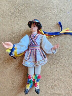 Colorful Eastern European Folk Doll with Tassel Accents